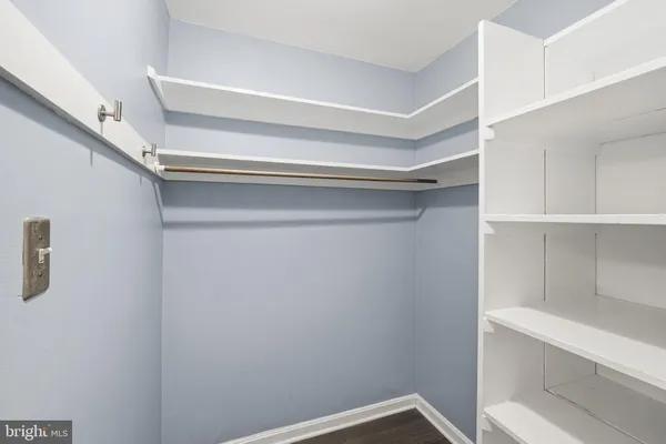 a view of an empty walk in closet