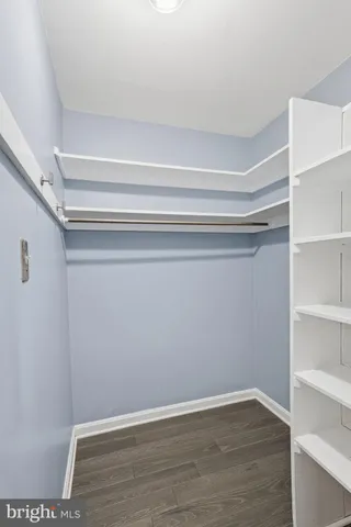 a view of an empty walk in closet
