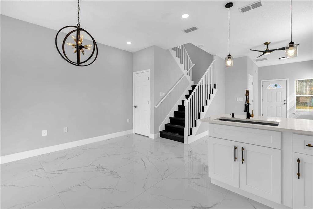 2404 Center Street Sanford, FL 32771 - Photo 5 of 29 a view of an entryway with wooden floor