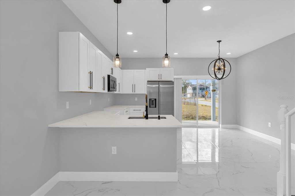 2404 Center Street Sanford, FL 32771 - Photo 7 of 29 a very nice looking kitchen with a large window