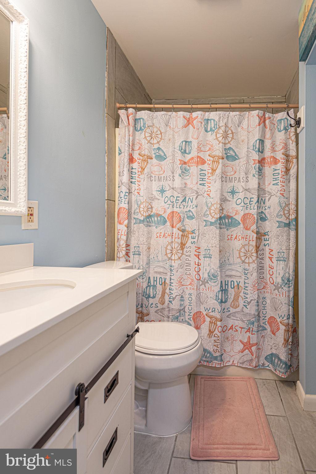 63 Drawbridge Road Ocean Pines, MD 21811 - Photo 42 of 102 a bathroom with a sink toilet and shower