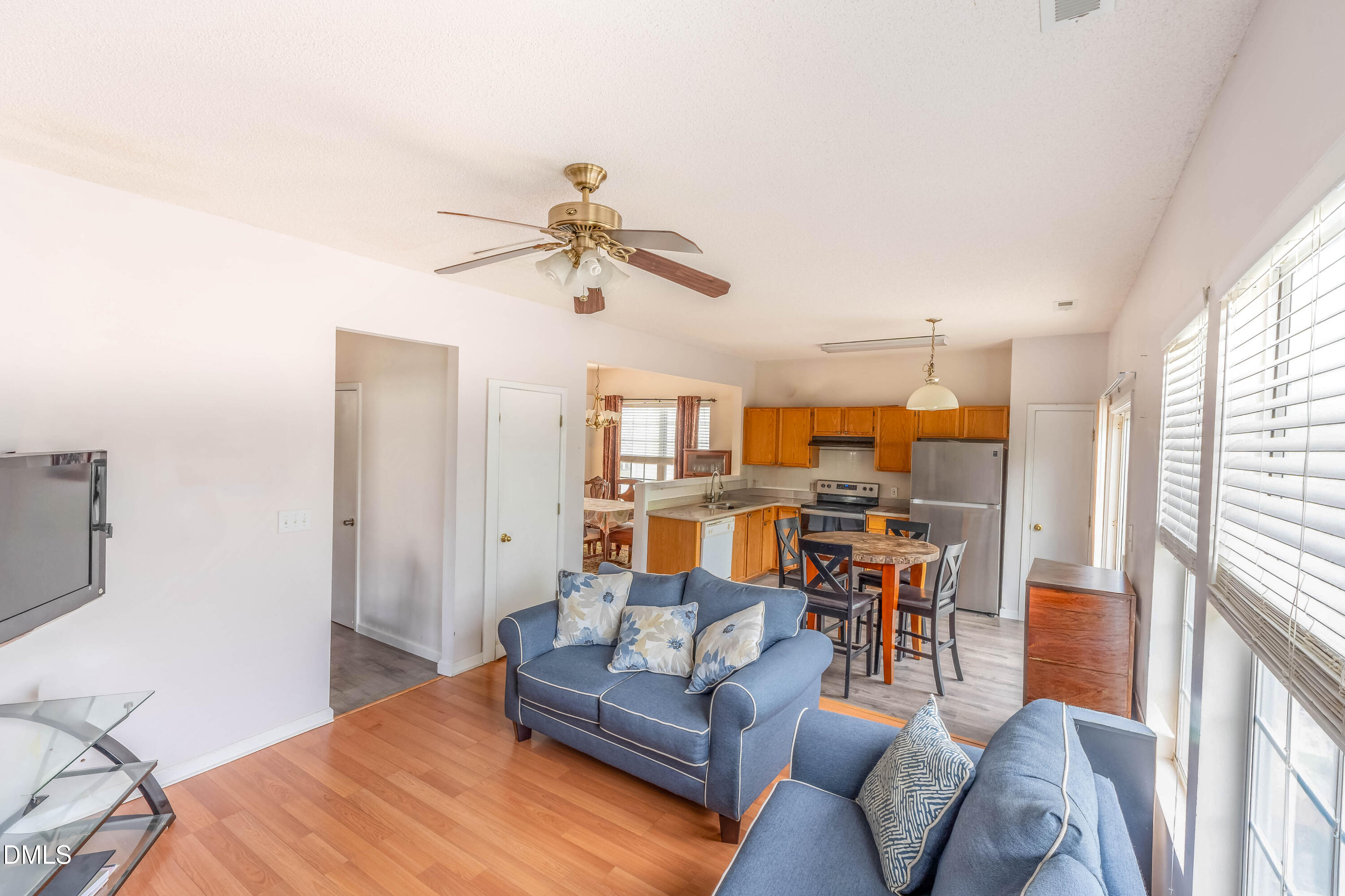 220 Purple Leaf Road Fuquay-Varina, NC 27526 - Photo 10 of 18 a living room with furniture and kitchen view