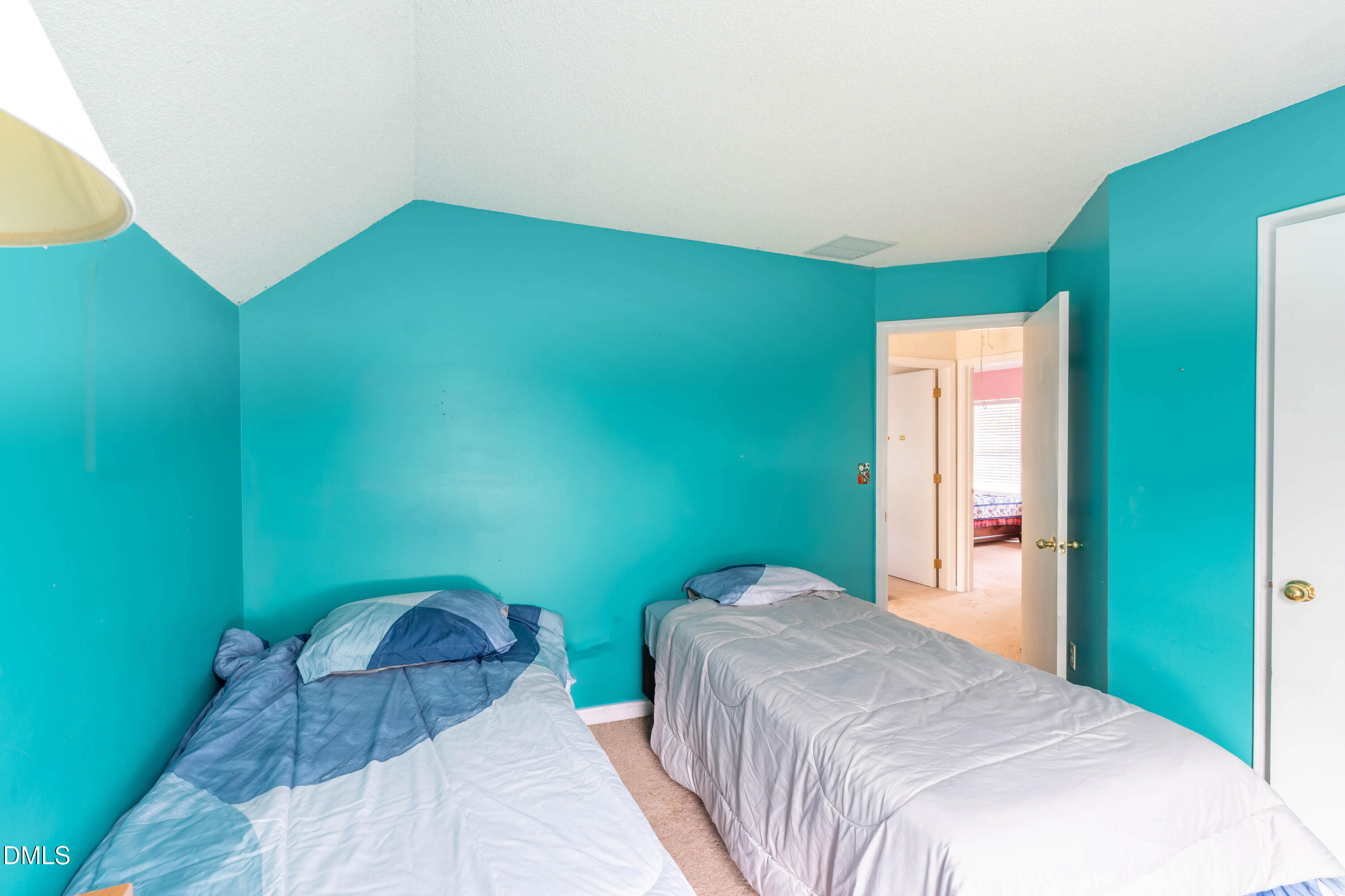 220 Purple Leaf Road Fuquay-Varina, NC 27526 - Photo 12 of 18 a bedroom with a bed and a table