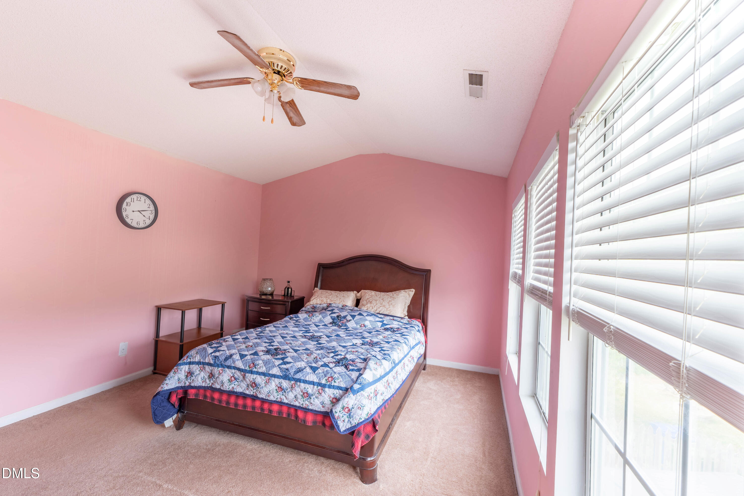 220 Purple Leaf Road Fuquay-Varina, NC 27526 - Photo 13 of 18 a bedroom with a bed and window