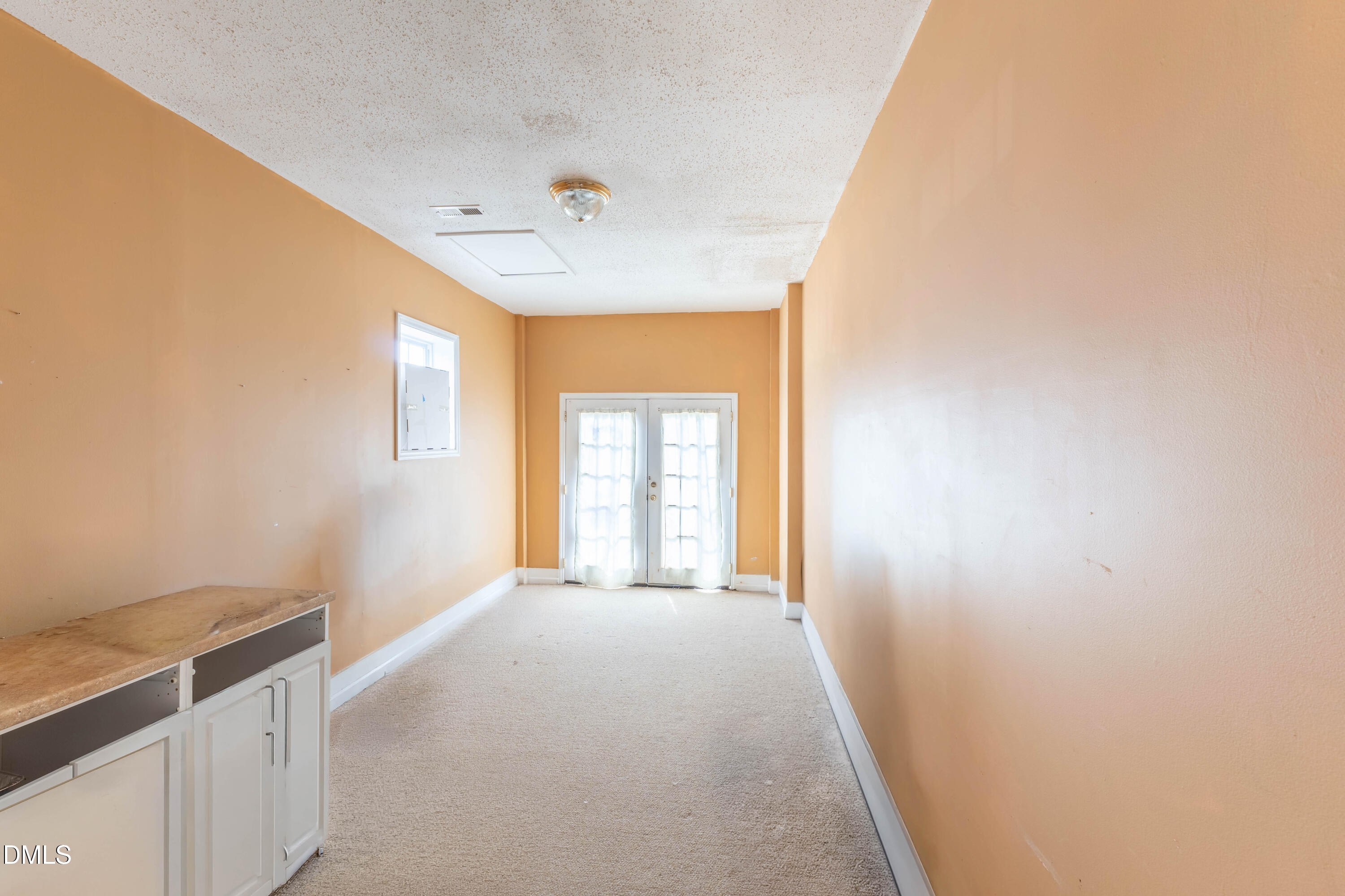 220 Purple Leaf Road Fuquay-Varina, NC 27526 - Photo 16 of 18 a view of an empty room with a window