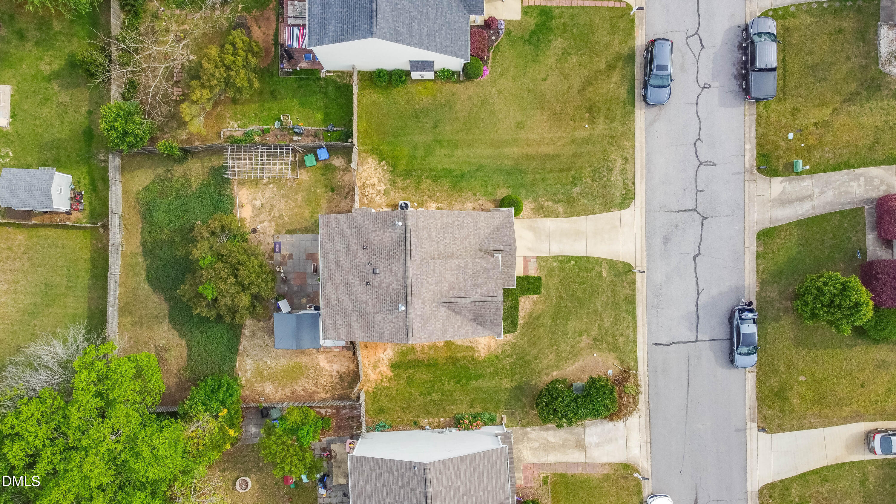 220 Purple Leaf Road Fuquay-Varina, NC 27526 - Photo 3 of 18 an aerial view of residential houses with outdoor space and swimming pool