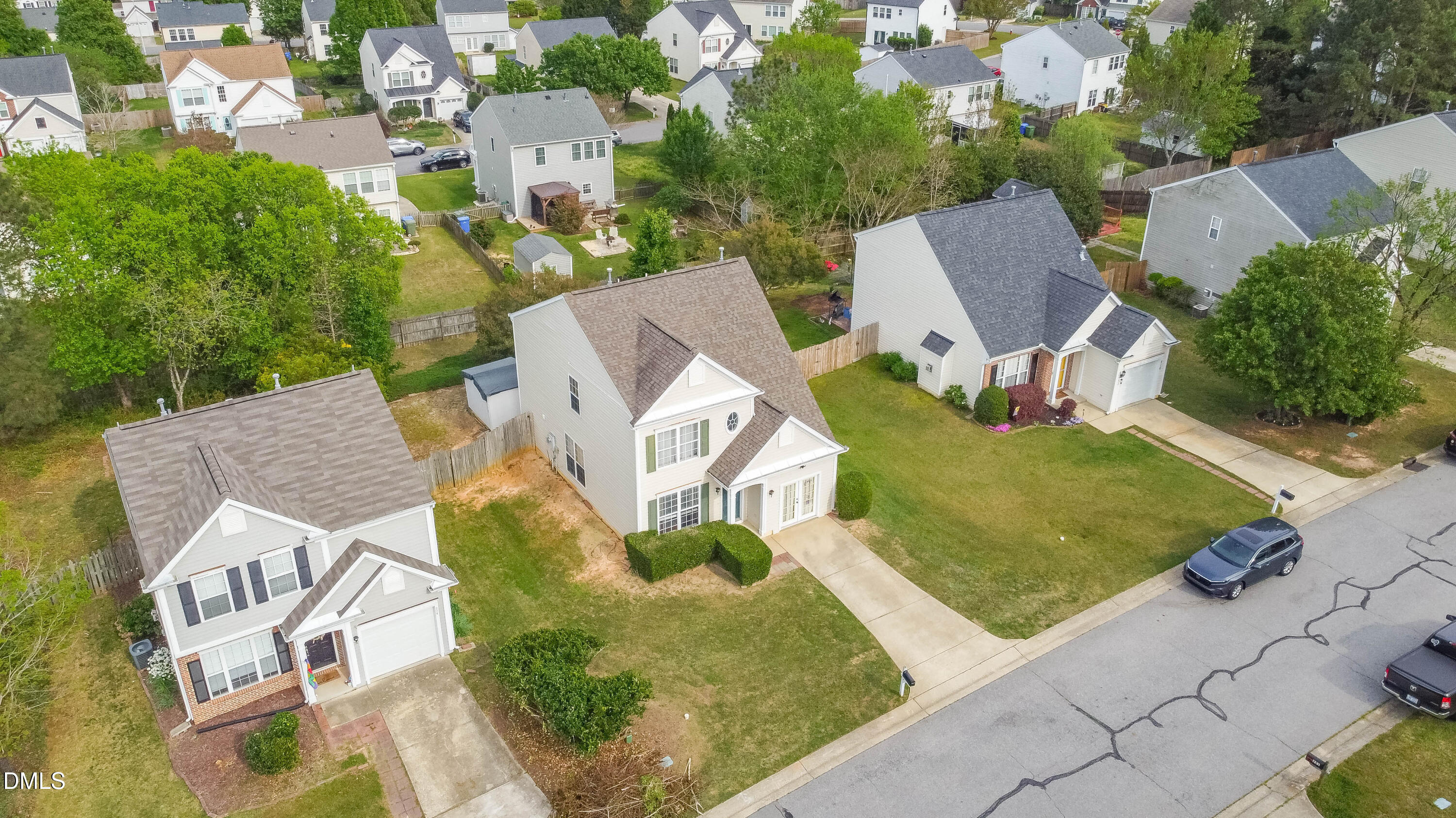 220 Purple Leaf Road Fuquay-Varina, NC 27526 - Photo 6 of 18 an aerial view of a house with swimming pool and outdoor space