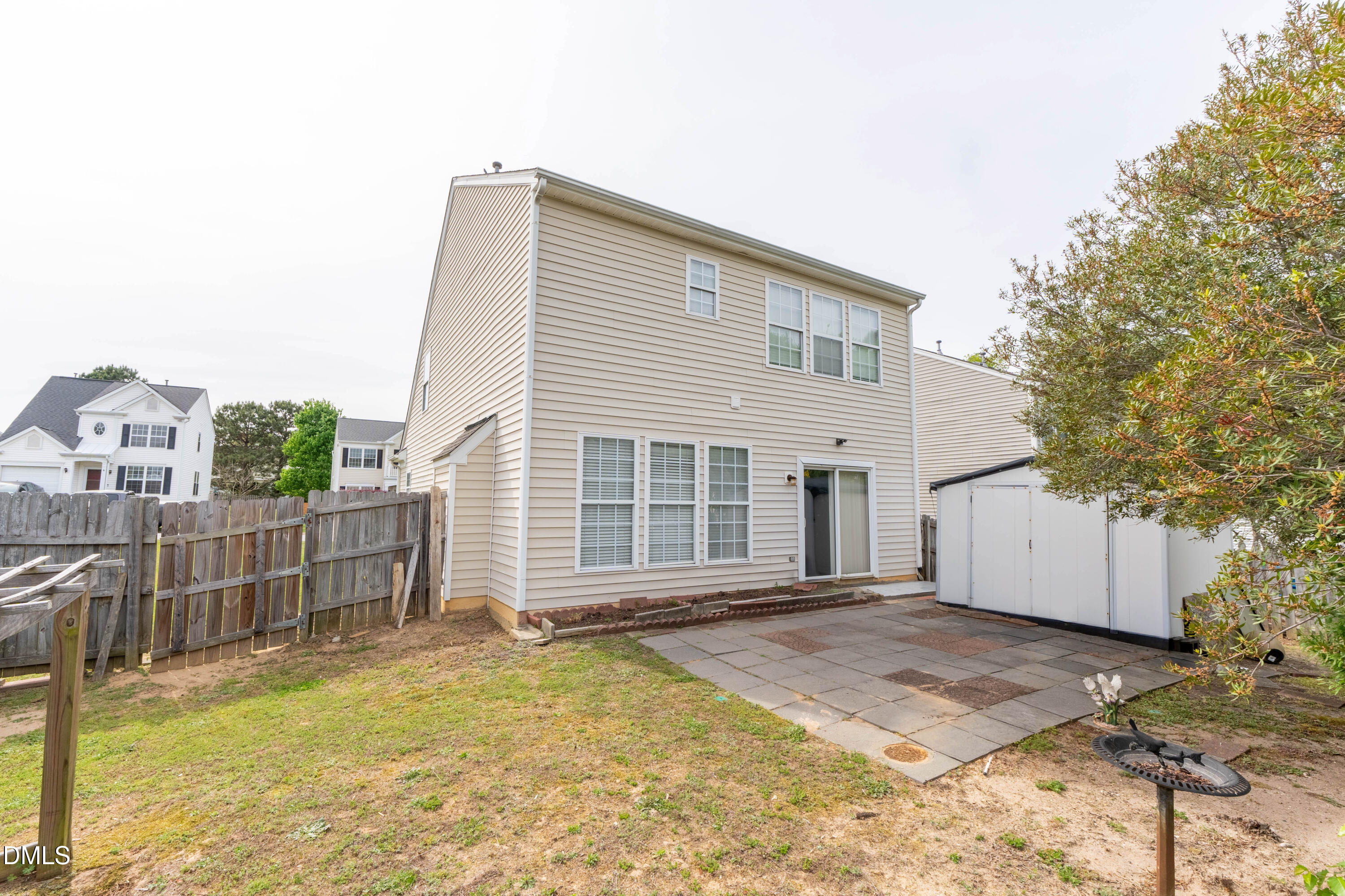 220 Purple Leaf Road Fuquay-Varina, NC 27526 - Photo 8 of 18 a view of a house with a backyard