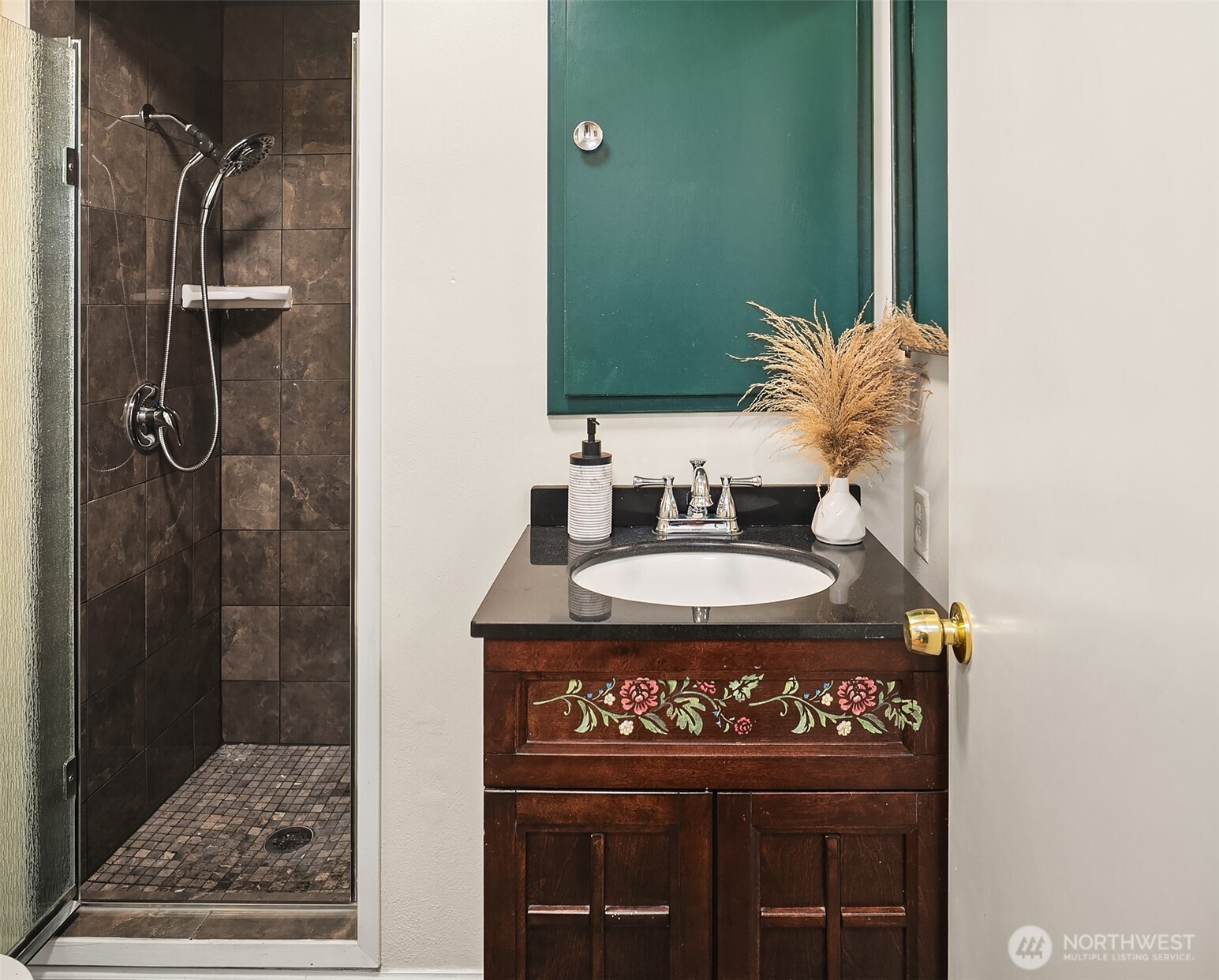 726 North 86th Street Seattle, WA 98103 - Photo 17 of 31 a bathroom with a sink and a mirror