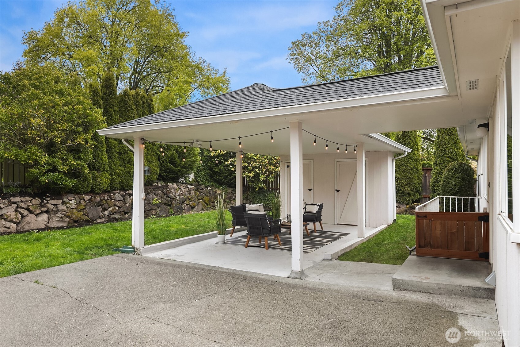 726 North 86th Street Seattle, WA 98103 - Photo 22 of 31 a view of a house with backyard and porch