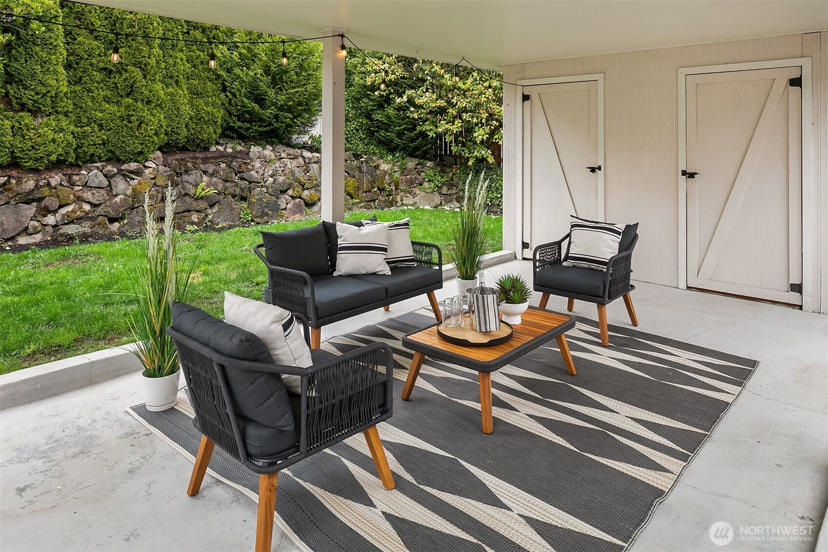 726 North 86th Street Seattle, WA 98103 - Photo 23 of 31 a outdoor living space with patio furniture and garden view