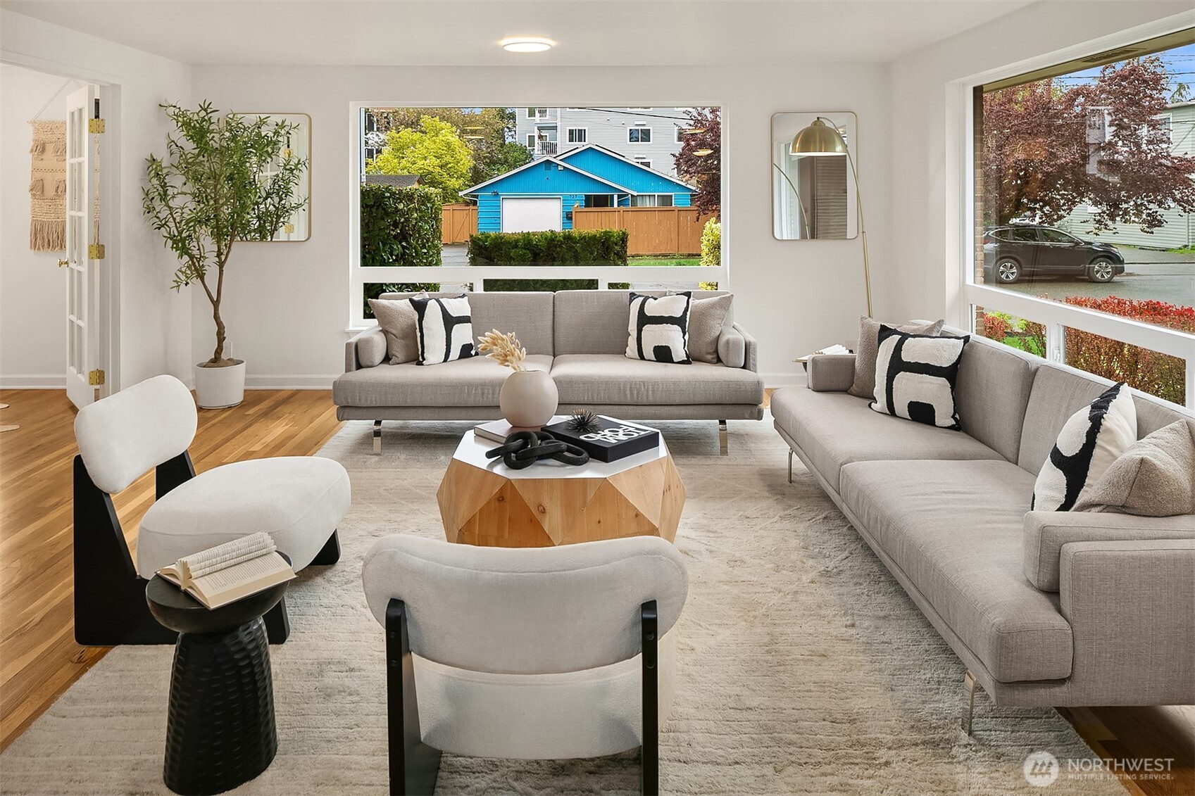 726 North 86th Street Seattle, WA 98103 - Photo 3 of 31 a living room with furniture and a large window