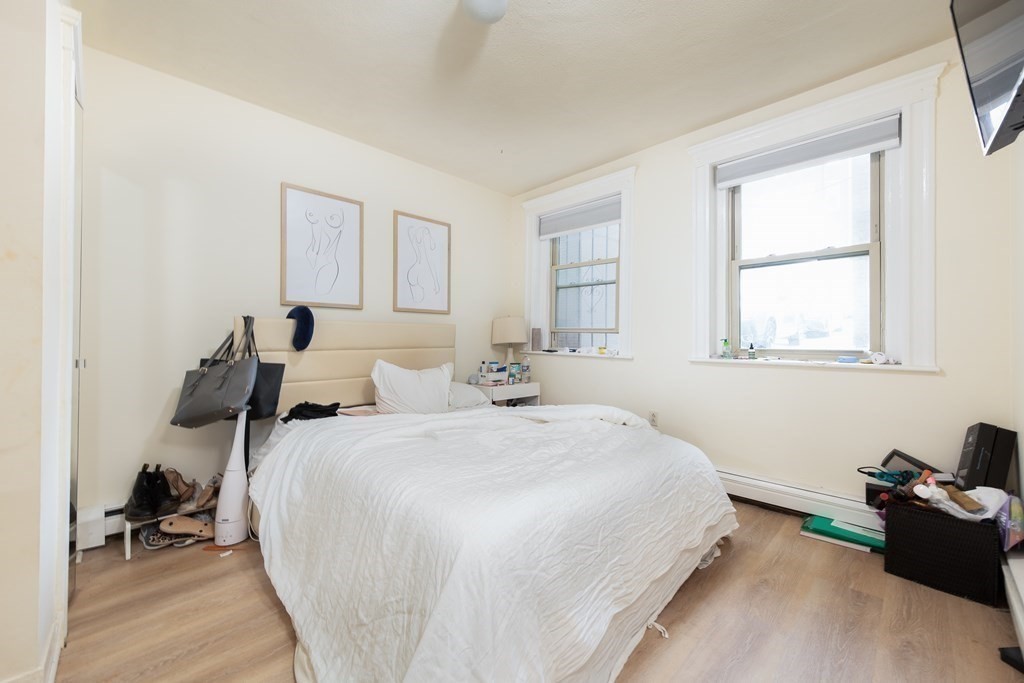 12 Ransom Road, Unit 16 Boston, MA 02135 - Photo 12 of 17 a bedroom with bed and a window