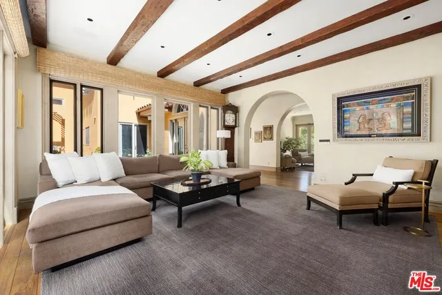 a kitchen with granite countertop a sink stove and cabinets