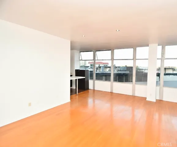 en empty room with windows