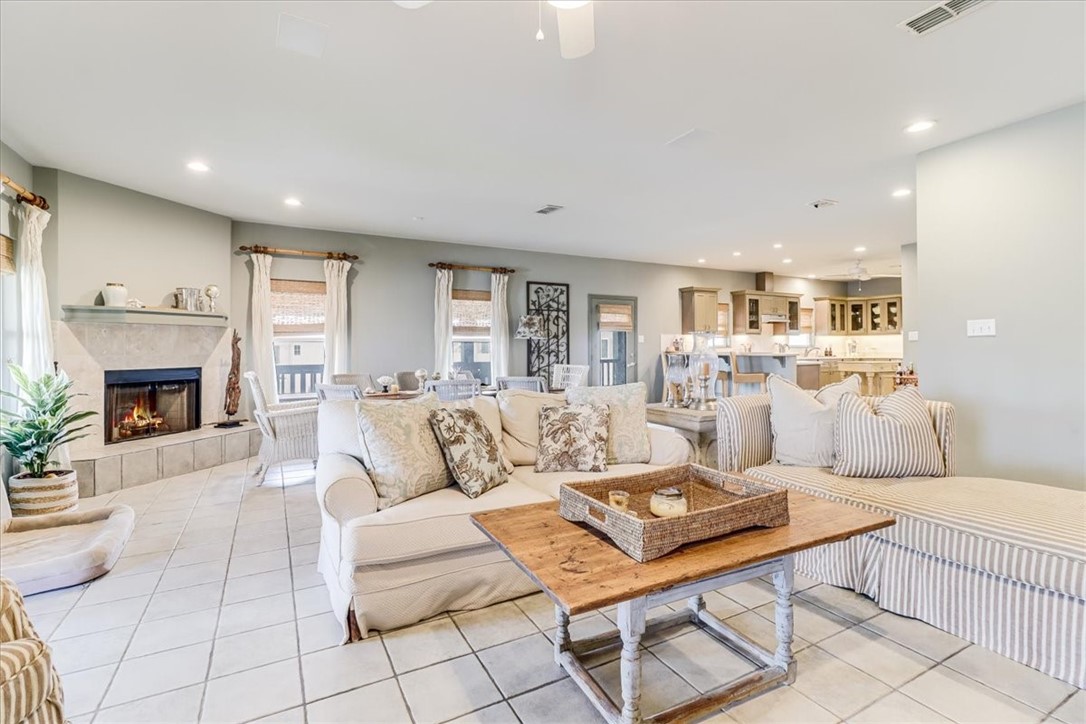 488 Margo Lane Port Aransas, TX 78373 - Photo 15 of 40 a living room with furniture and a fireplace