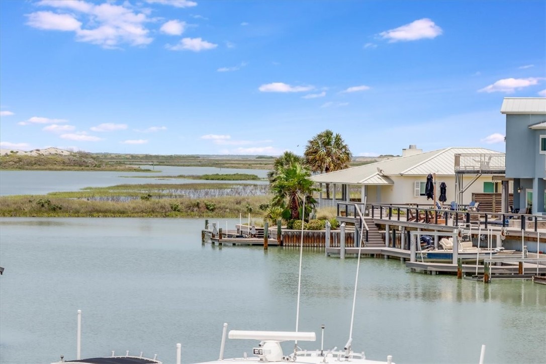 488 Margo Lane Port Aransas, TX 78373 - Photo 17 of 40 a view of a lake with a house