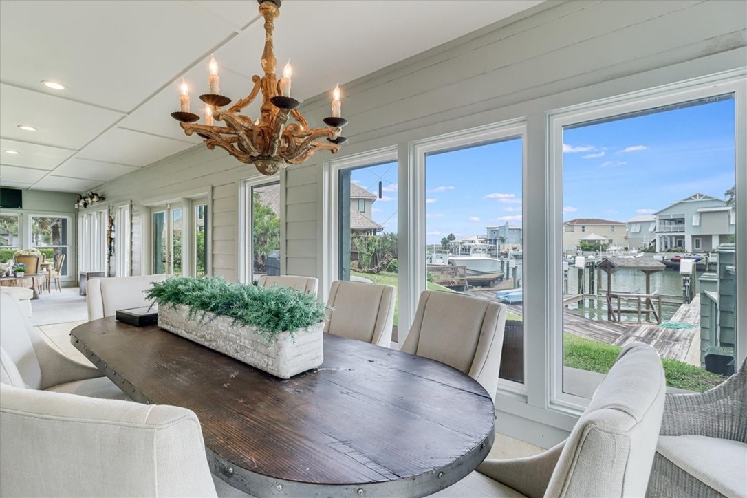 488 Margo Lane Port Aransas, TX 78373 - Photo 32 of 40 a view of a livingroom with furniture window and wooden floor