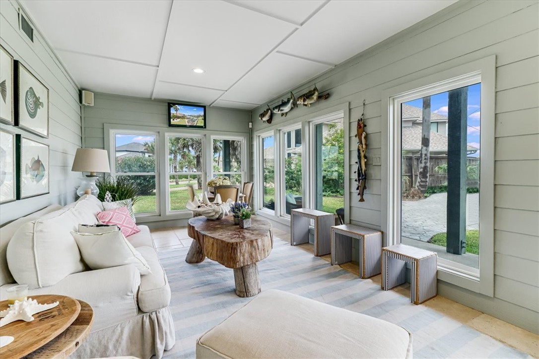 488 Margo Lane Port Aransas, TX 78373 - Photo 33 of 40 a living room with furniture and a large window