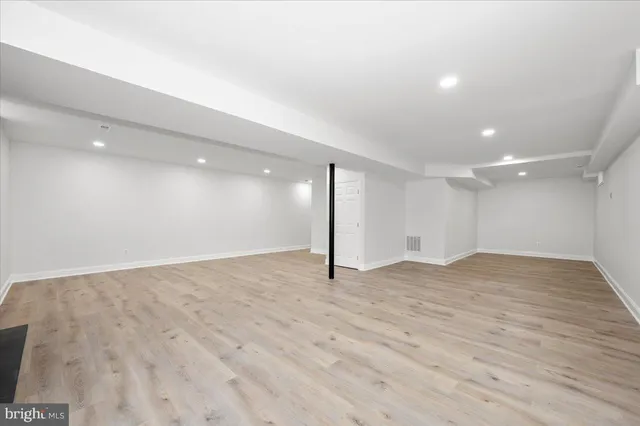 a view of a backyard with table and chairs