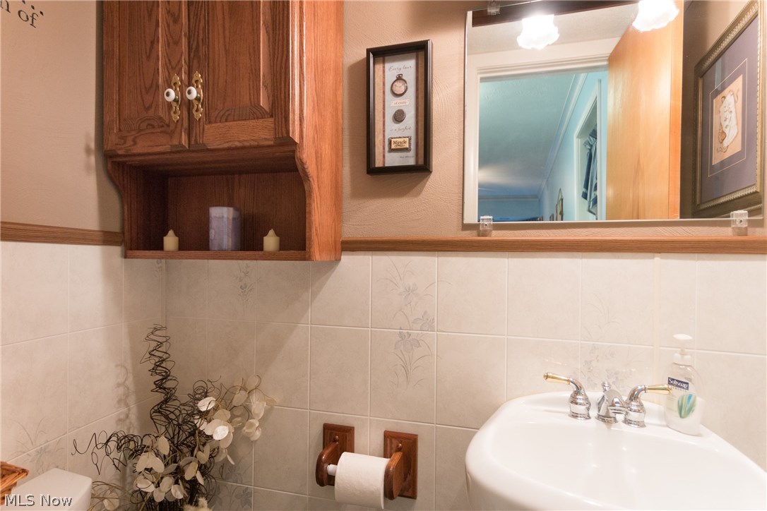 7579 Little Mountain Road Mentor, OH 44060 - Photo 27 of 33 Half bath on 1st floor