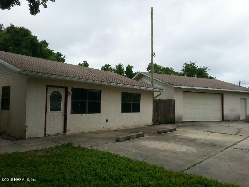 243 Dusty Road St. Augustine, FL 32095 - Photo 25 of 25 a backyard of a house with lots of green space