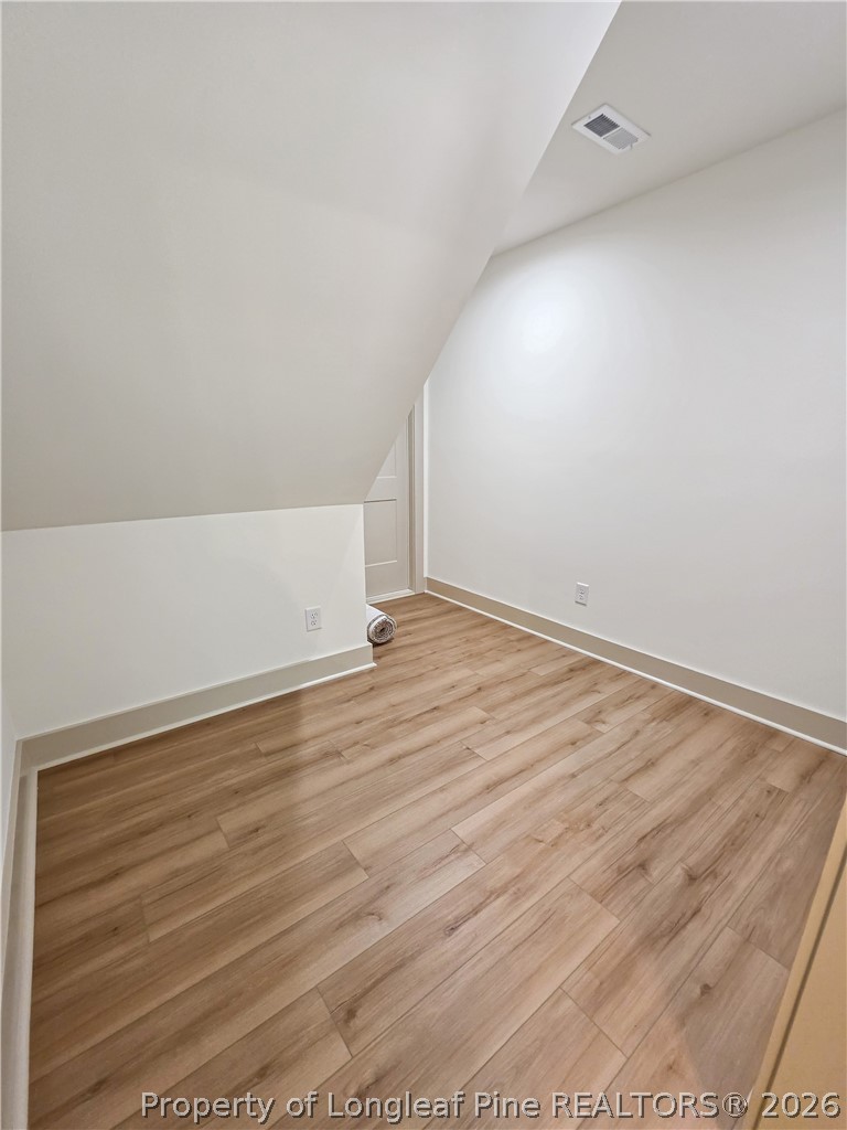 900 Niagara Carthage Road Carthage, NC 28327 - Photo 20 of 38 an empty room with wooden floor