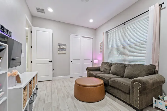 a view of a garage with a car and a car