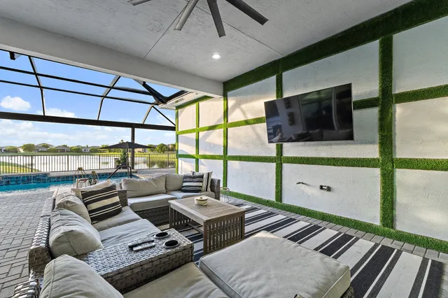 a view of swimming pool with a patio