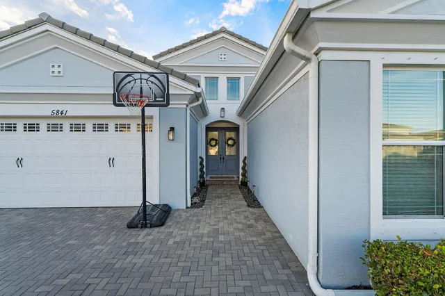 a view of a hallway with front door