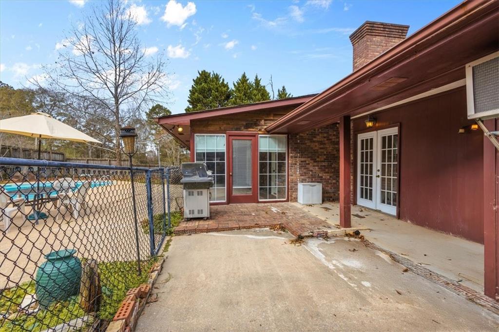 202 Ridgewood Road Cedartown, GA 30125 - Photo 15 of 45 a view of a house with a patio