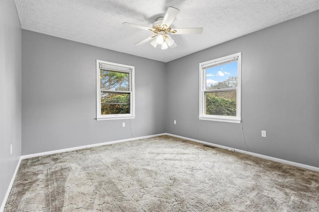 202 Ridgewood Road Cedartown, GA 30125 - Photo 29 of 45 a view of an empty room with a window