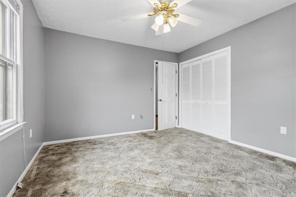 202 Ridgewood Road Cedartown, GA 30125 - Photo 30 of 45 a view of an empty room with a window