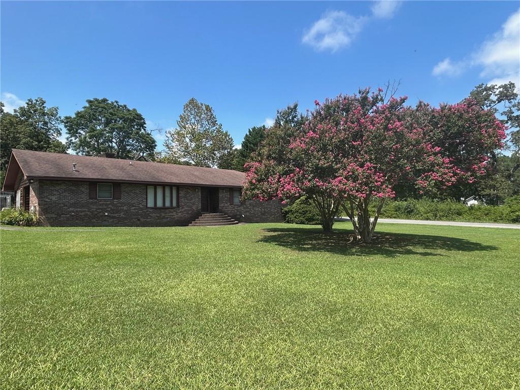 202 Ridgewood Road Cedartown, GA 30125 - Photo 6 of 45 a view of a house with a yard