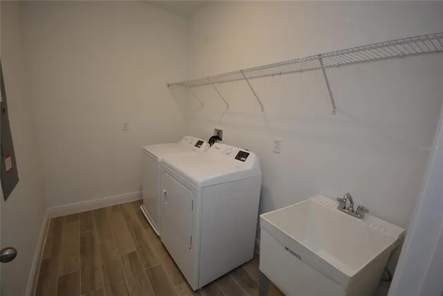 a utility room with dryer and washer