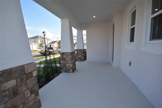 a workspace with furniture and chandelier