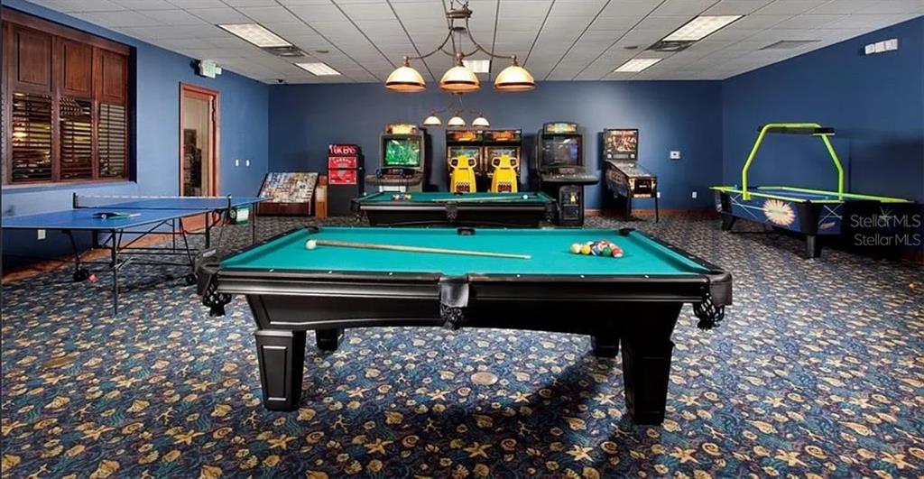 8961 Majesty Palm Road Kissimmee, FL 34747 - Photo 34 of 40 a room with pool table table tennis pool table and windows