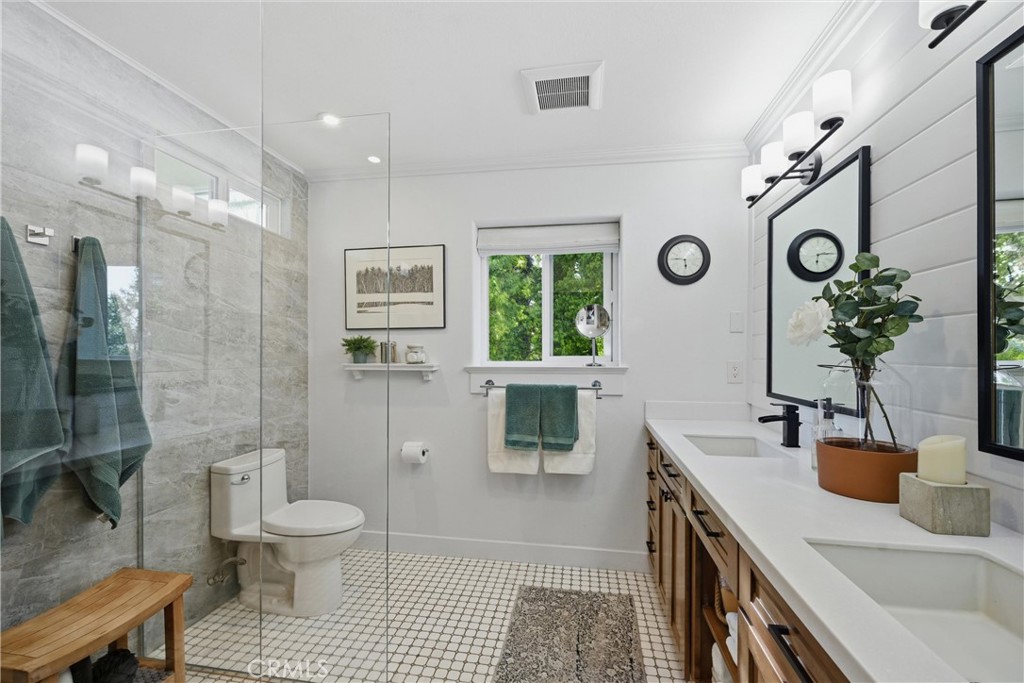17432 Greenridge Road Hidden Valley Lake, CA 95467 - Photo 37 of 72 a bathroom with a sink a toilet and shower