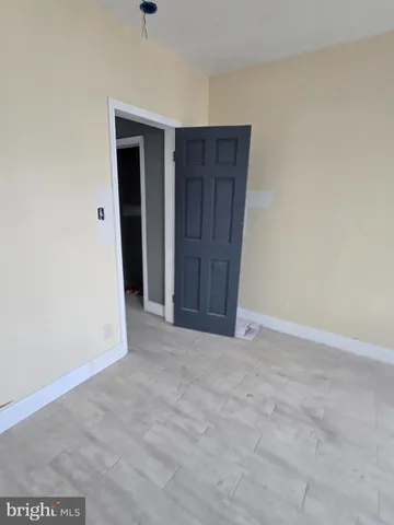 an empty room with closet