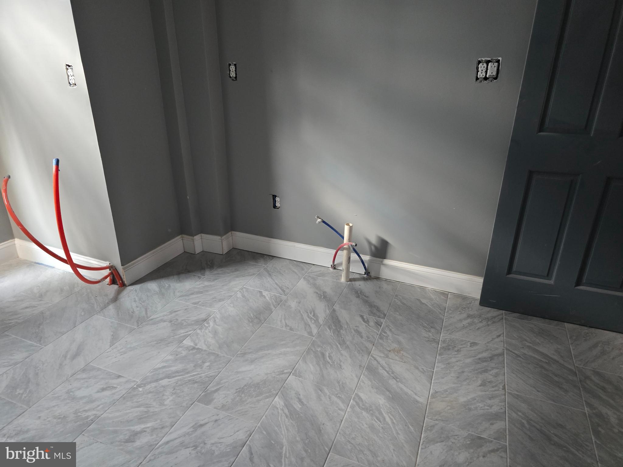 424 Highland Avenue Chester, PA 19013 - Photo 6 of 13 a view of a livingroom with a sink