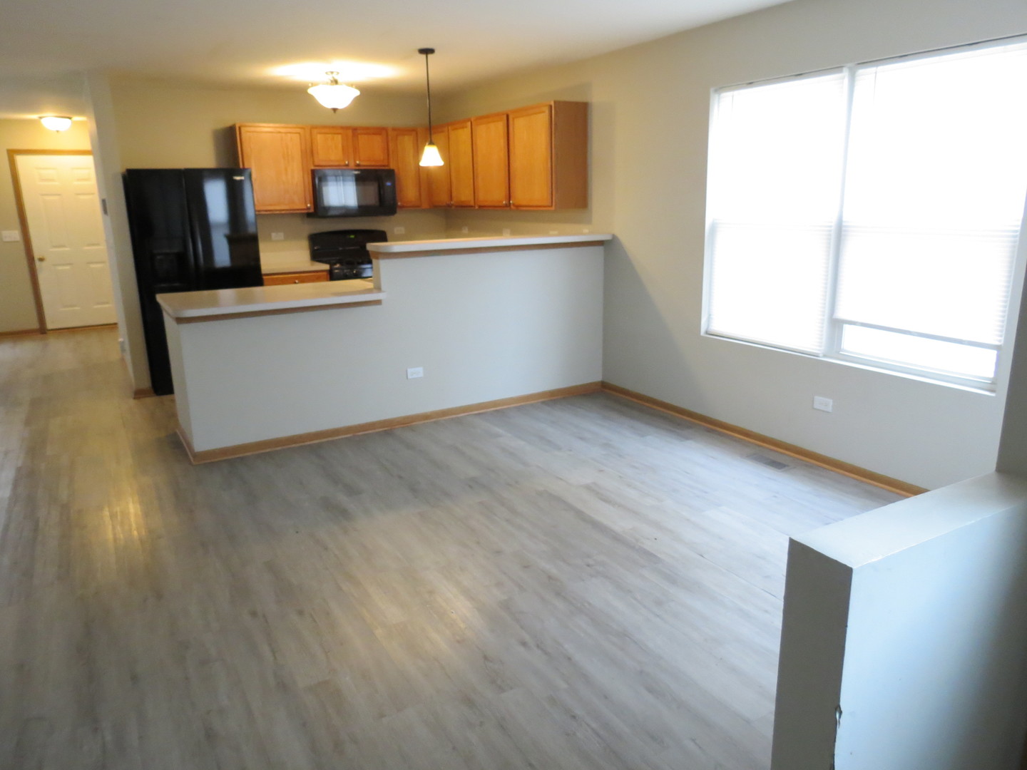 191 Mountain Laurel Court Romeoville, IL 60446 - Photo 13 of 29 a kitchen with stainless steel appliances a refrigerator and a sink