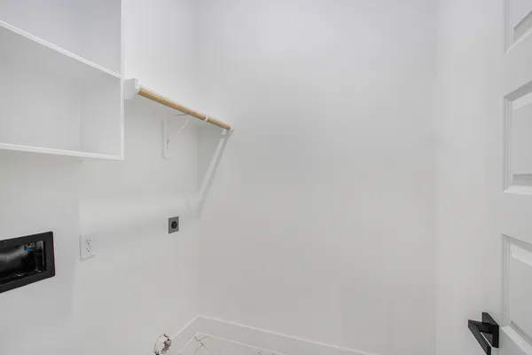 a view of small space with racks on the wall