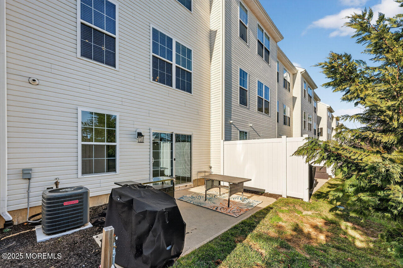 208 Prestige Road Brick, NJ 08723 - Photo 29 of 33 a view of a house with a patio