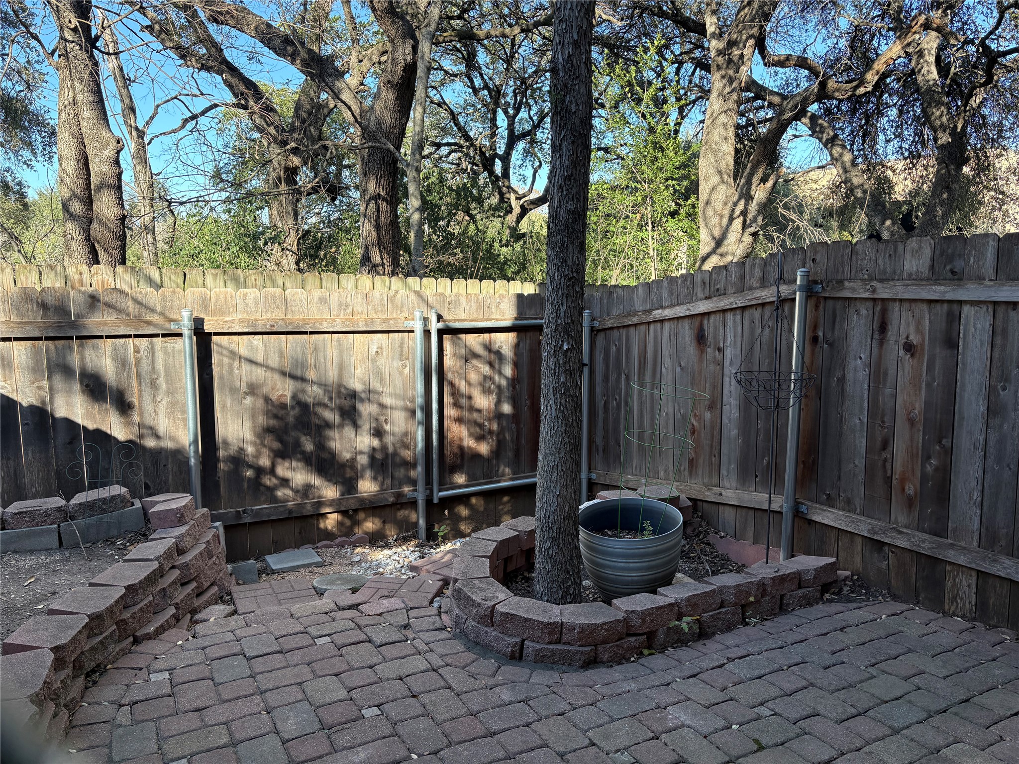 9226 Jollyville Road, Unit 144 Austin, TX 78759 - Photo 32 of 40 Fenced backyard featuring a patio area