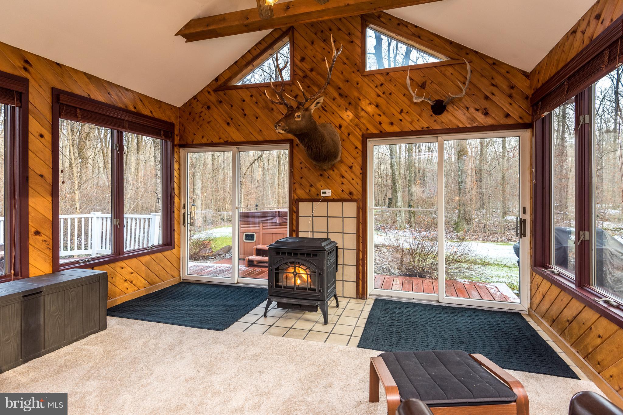 1392 Cobbler Road Quakertown, PA 18951 - Photo 6 of 65 Light, Bright Sunroom with Pellet Stove