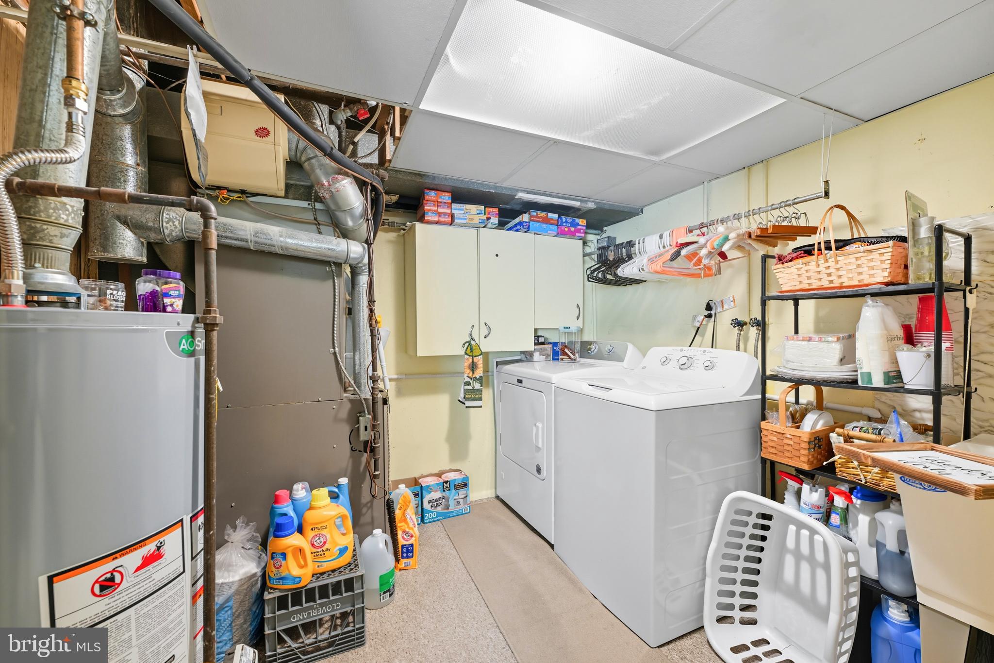 564 Byron Road Warminster, PA 18974 - Photo 23 of 49 a utility room with fridge dryer and washer