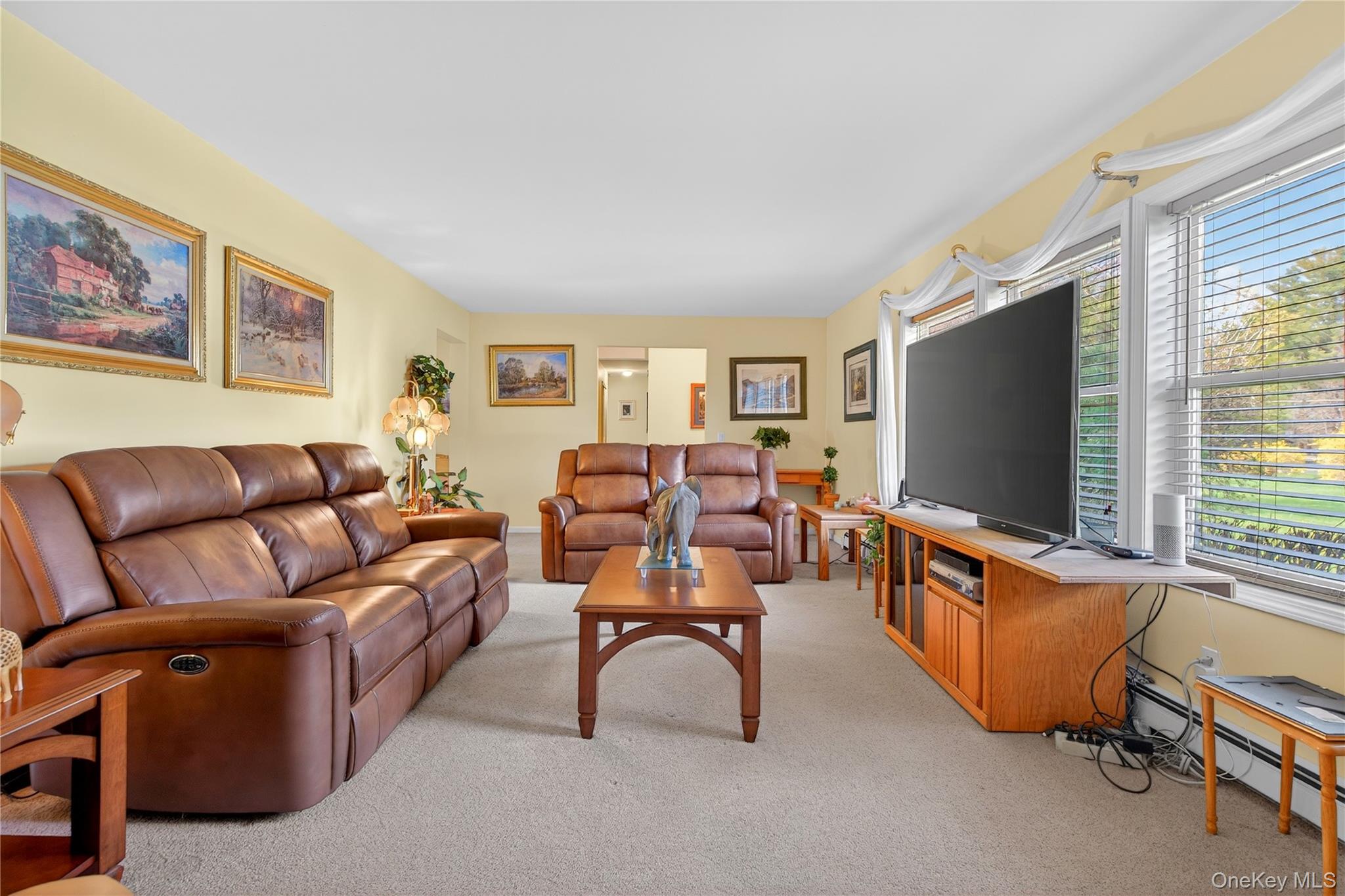 1044 Blue Mountain Road Saugerties, NY 12477 - Photo 5 of 32 a living room with furniture and a flat screen tv