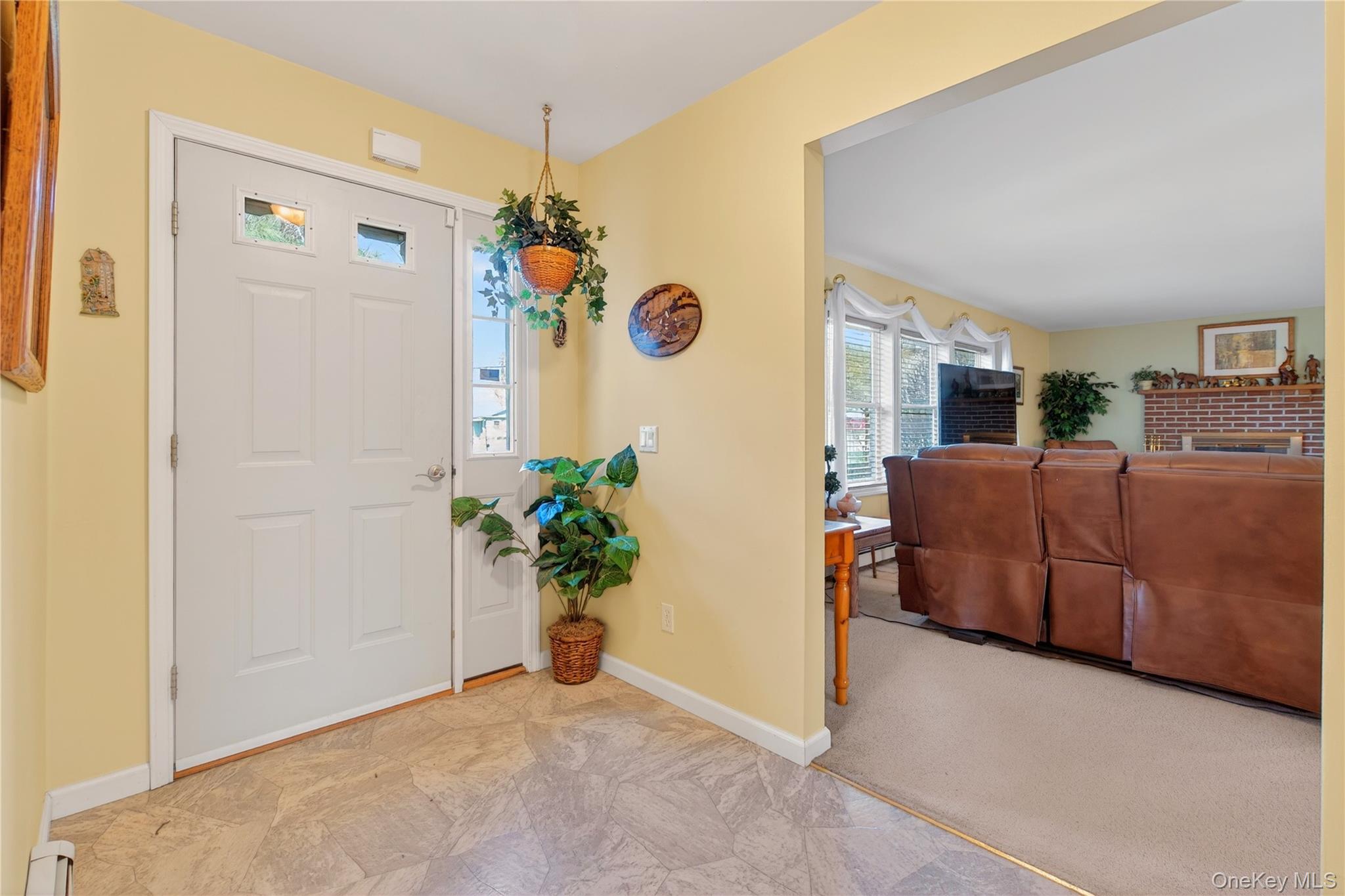 1044 Blue Mountain Road Saugerties, NY 12477 - Photo 7 of 32 a view of a livingroom with a potted plant