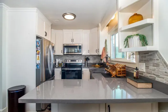 a bed room with a bed and a fireplace