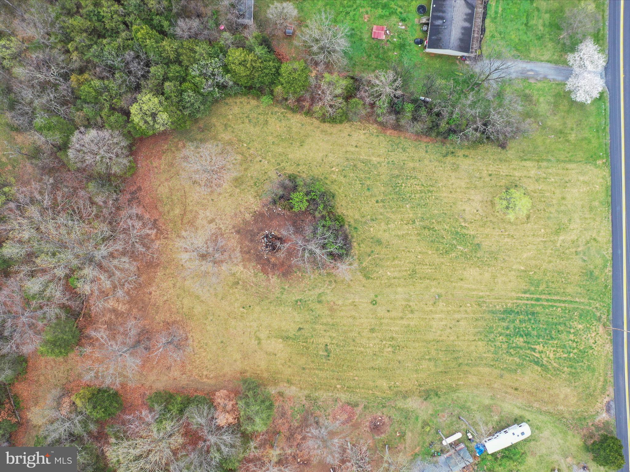 Summit Point Rd Summit Point Summit Point, WV 25446 - Photo 12 of 26 a view of a pathway both side of a house